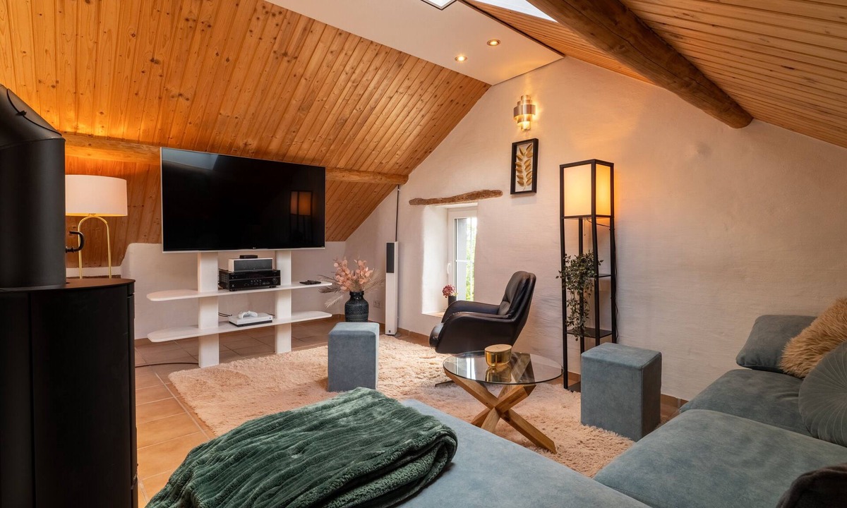 Feuerscheid House | Charming Eifel Bakehouse with Sauna, Private Terrace & EV Charging