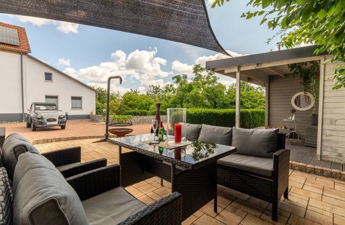 Feuerscheid House | Charming Eifel Bakehouse with Sauna, Private Terrace & EV Charging