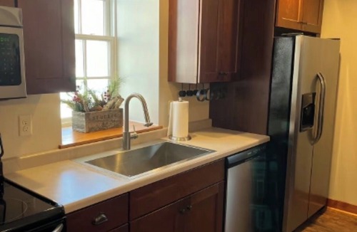 Dubuque House | Hidden Gem! Uniquely, fully-furnished, newly remodeled, 1860’s carriage house