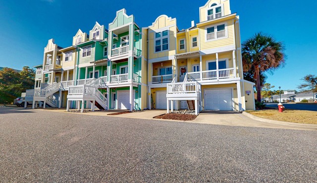 3BR coastal retreat with pool, gym, W/D, & balcony in Kill Devil Hills