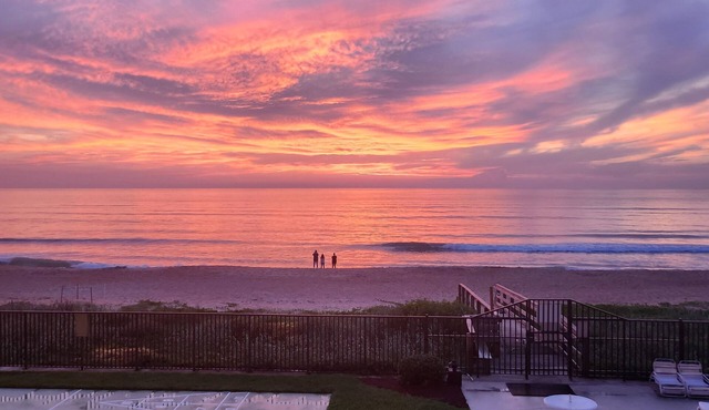 Actually on the beach! Step off balcony onto the beach & pool! Rare Find! in Ormond Beach