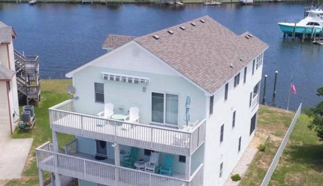 Canal Front Home with Private Dock, Multiple Decks & Hot Tub in Kill Devil Hills