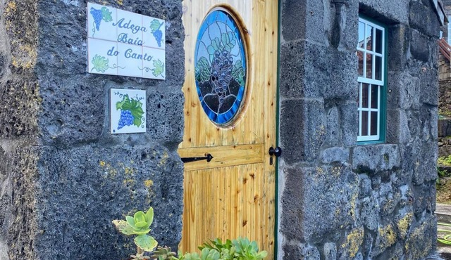 Enchanting view from the balcony of beautifully restored "Adega Baia do Canto". in Sao Roque do Pico