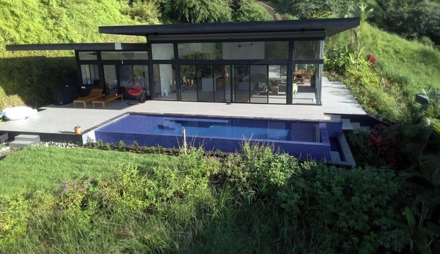 Majestic Jungle and Ocean view 2-bedroom house with 2 pools and a gym on 4 acres in Savegre de Aguirre