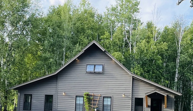 Modern and cozy cottage with direct access to miles of trail riding in Sturgeon Lake