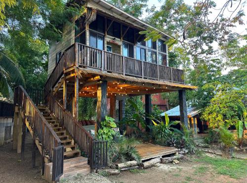Negril Huts Enchantment - Cottages in trees with AC, ocean views, pool, Sea access in Negril