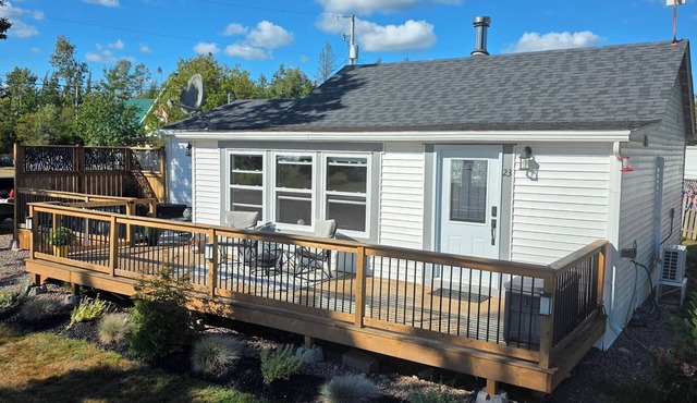 Newly renovated cottage. 30 second walk to the beach. New hot tub addition! in Bass River