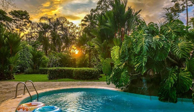 Private suite 103 with beautiful gardens, shared pool and BBQ area! in Puntarenas Province