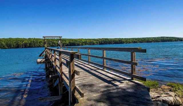 Private waterfront home with large deck & deep water dock in Georgetown