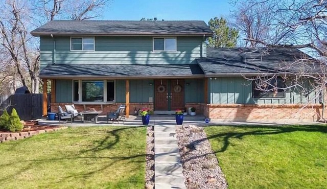 Stunning Family Home —Mountain & Golf Course Views in Centennial