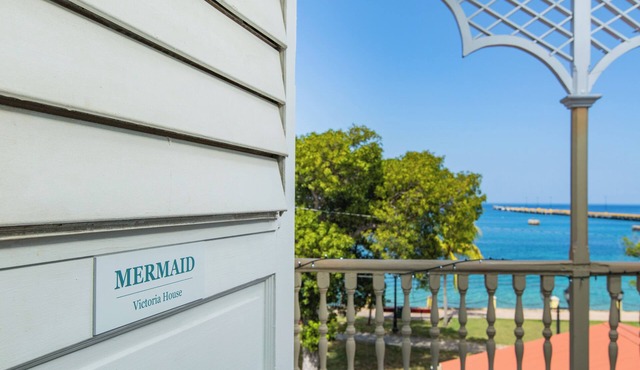 VERY Spacious 3rd floor unit with gorgeous ocean view and wrap around porch